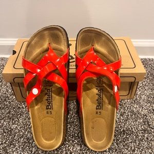 Betula’s licensed by Birkenstock, red patent criss cross sandals. Size 39/8